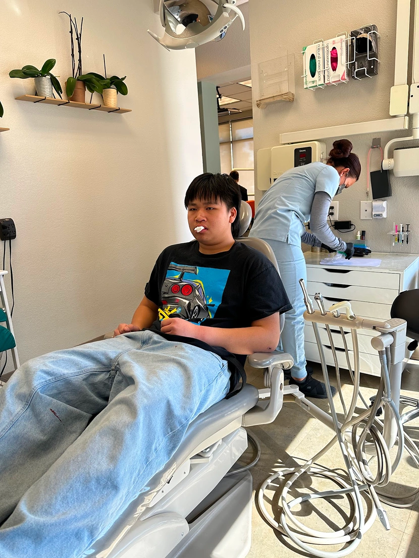 Dentist treating a patient